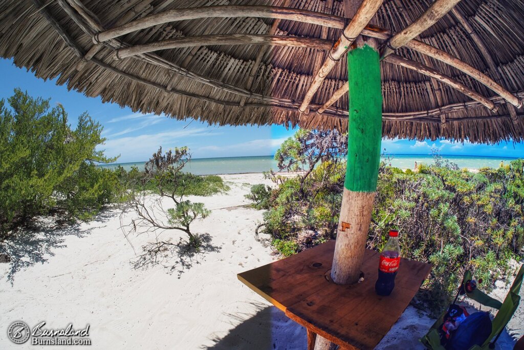 A before-and-after view from underneath the beach umbrella