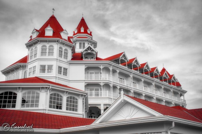 Red Rooftops stand out in a selective color look at the Grand Floridian Resort at Walt Disney World, and the English language is weird.