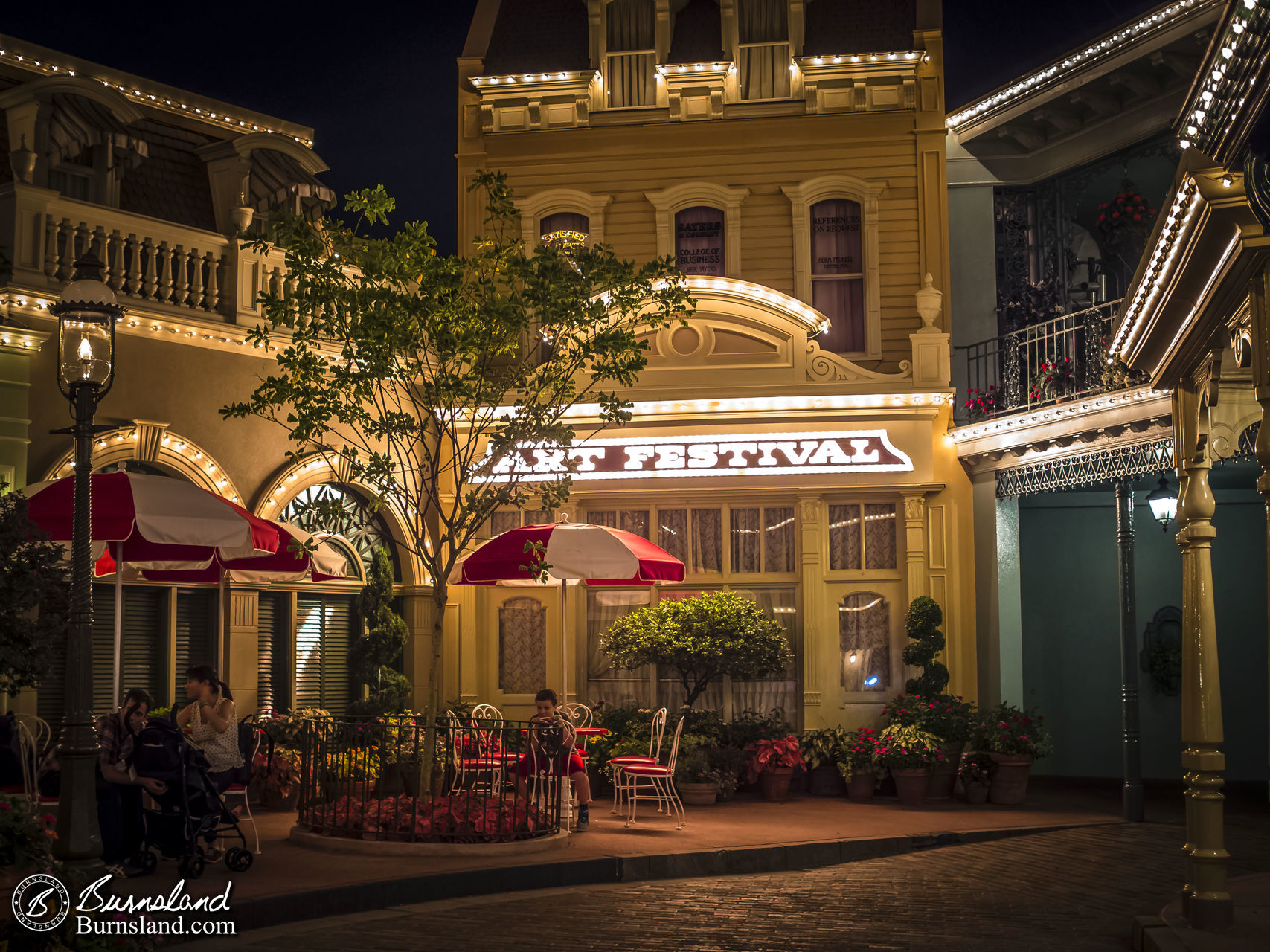 Relaxing on Center Street at Night in the Magic Kingdom