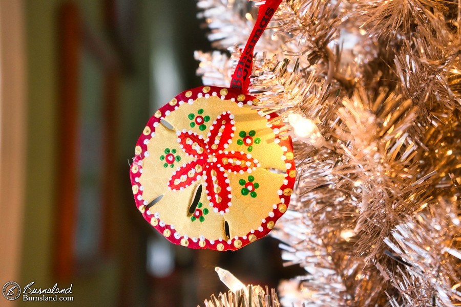 A painted sand dollar ornament is a perfect addition for our beach Christmas tree. Plus, it brings back some great memories.