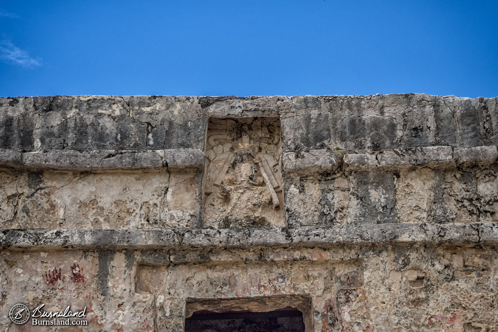 The Temple of the Frescoes stands among the Mayan ruins at Tulum in Mexico.