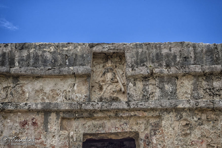 The Temple of the Frescoes stands among the Mayan ruins at Tulum in Mexico.