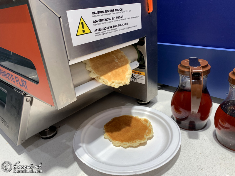 Getting pancakes from the pancake machine