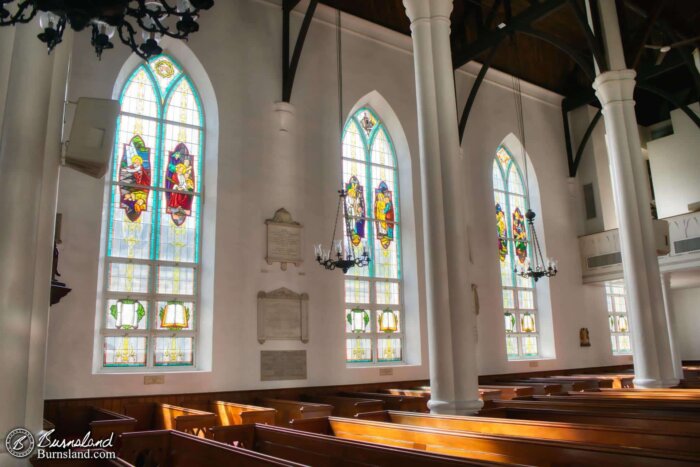 Sunlight streams in through the stained glass windows of Christ Church Cathedral in Nassau, Bahamas