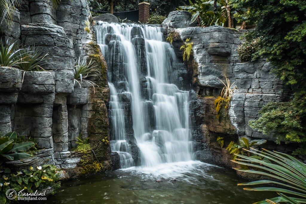 A tropical-looking waterfall flows down the rocks in the Delta Island area of the Gaylord Opryland Resort in Nashville, Tennessee. Read all about it at Burnsland!