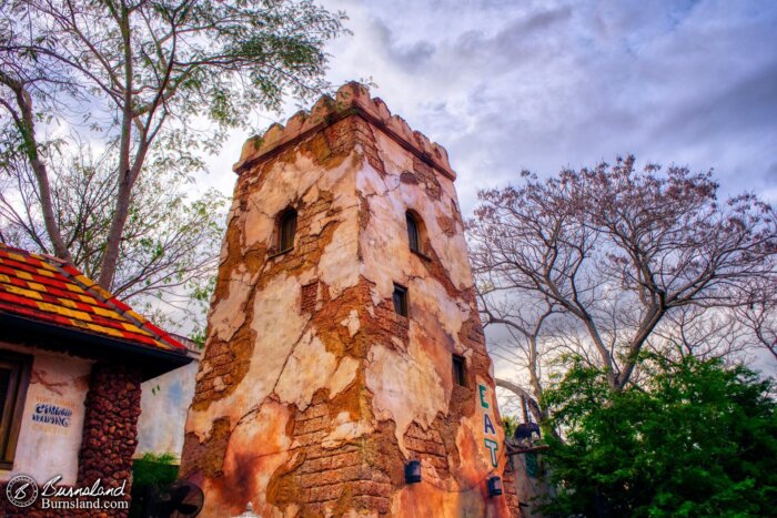 A stone tower serves as part of the facade for the Tusker House Restaurant in the Africa section of Disney’s Animal Kingdom at Walt Disney World.